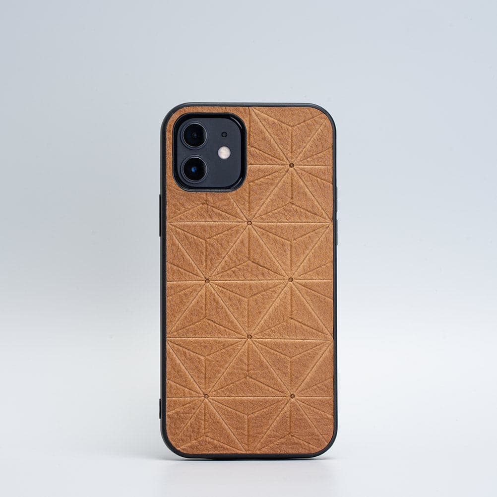 Premium Italian full-grain leather iPhone 12 case with geometric flower design and TPU bumper protection