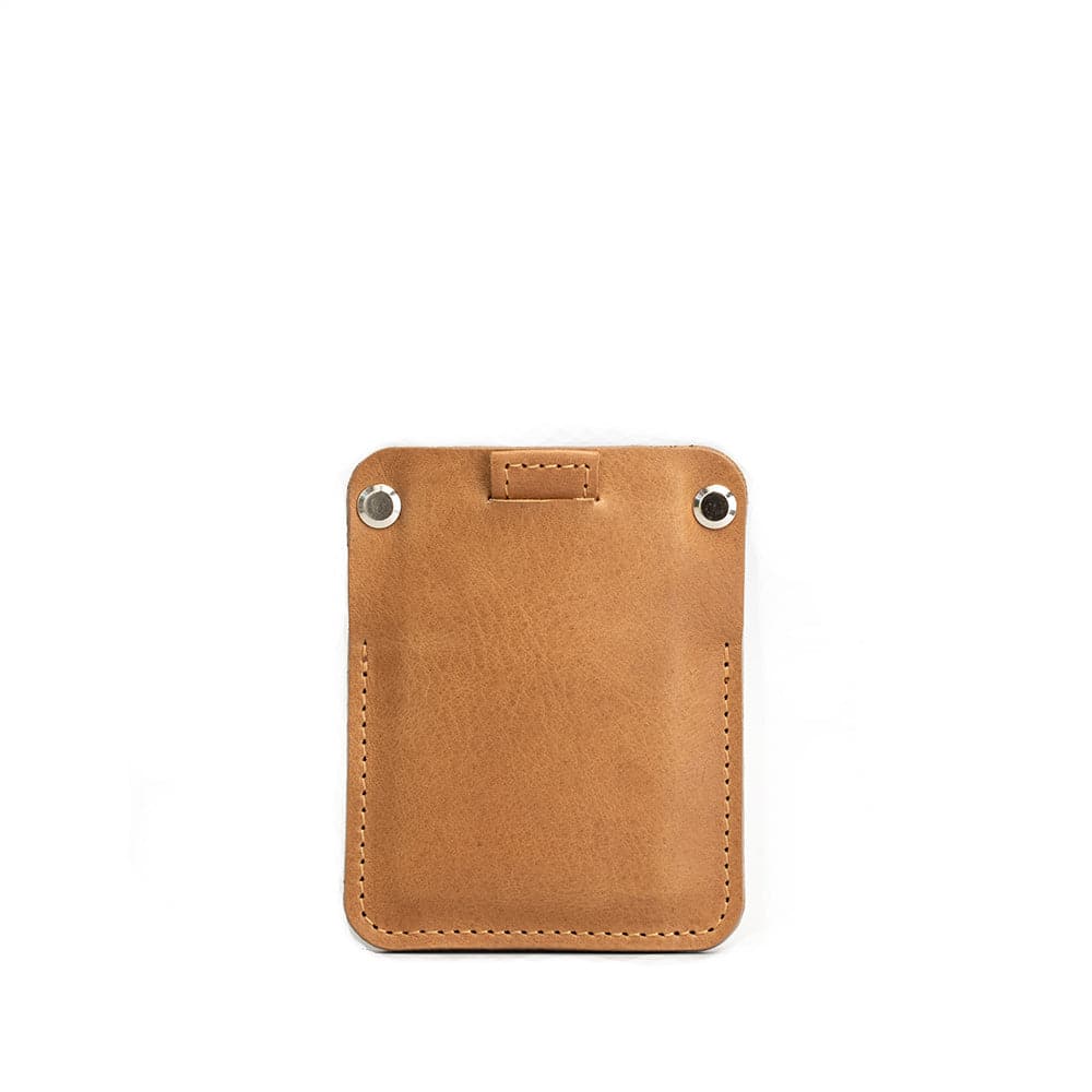 Minimalist tan leather AirTag wallet with stitched edges and hidden AirTag pocket for up to 7 cards.