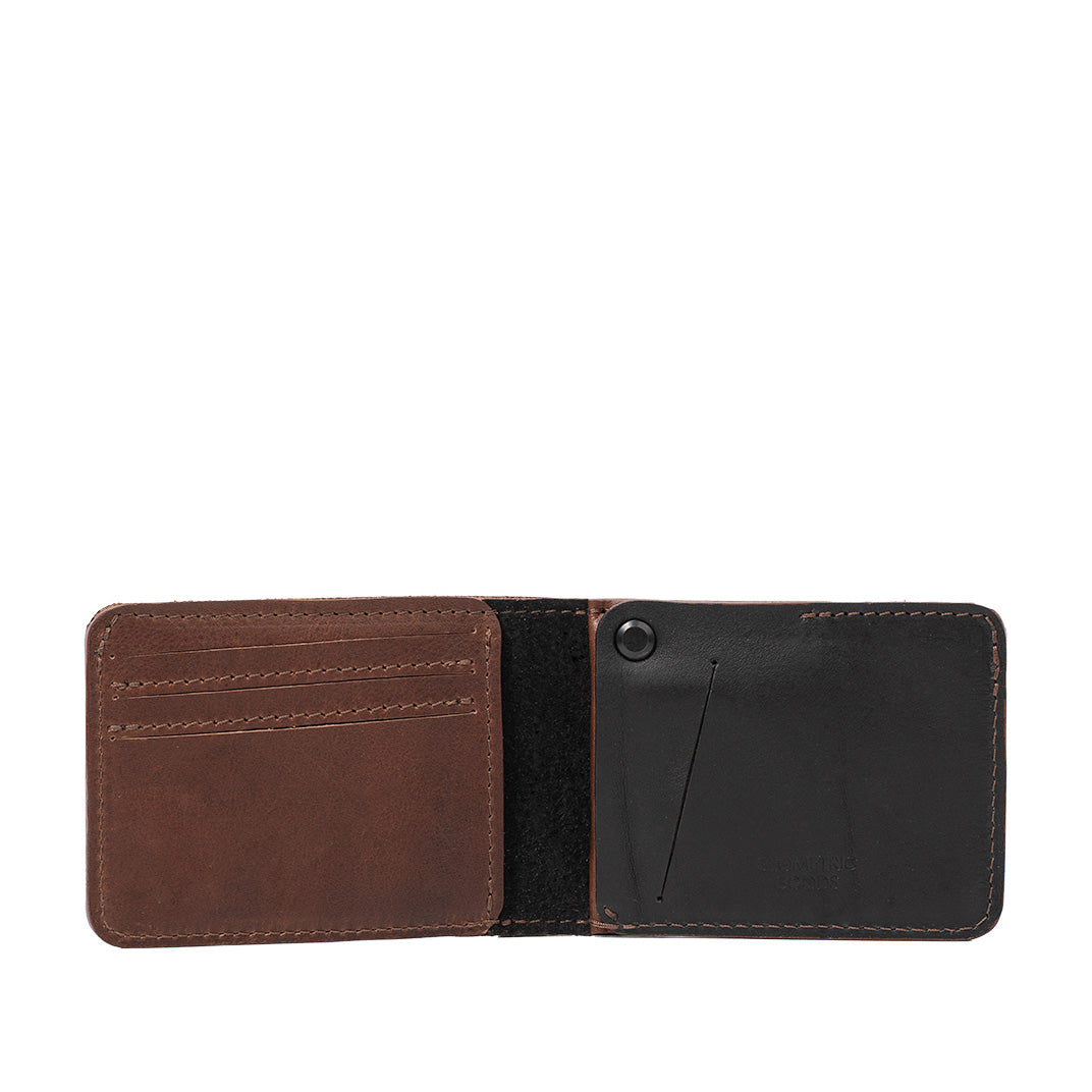 Brown leather Dollar Bill AirTag Wallet with card slots and hidden AirTag compartment, handcrafted with Italian vegetable-tanned leather.