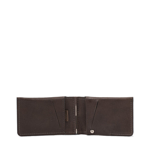 Slim brown leather AirTag wallet with money clip and multiple card slots, crafted from premium Italian leather.