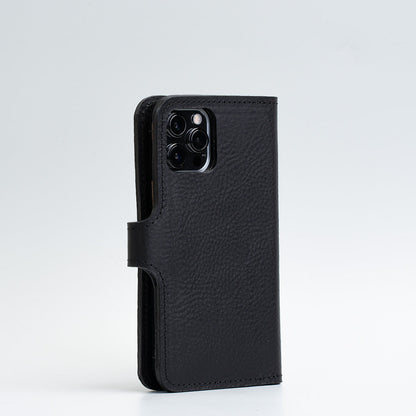 Black leather iPhone folio wallet with MagSafe, handcrafted premium Italian leather, magnetic closure, and multiple card pockets