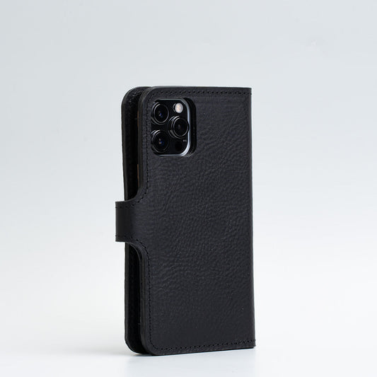Black leather iPhone folio wallet with MagSafe, handcrafted premium Italian leather, magnetic closure, and multiple card pockets