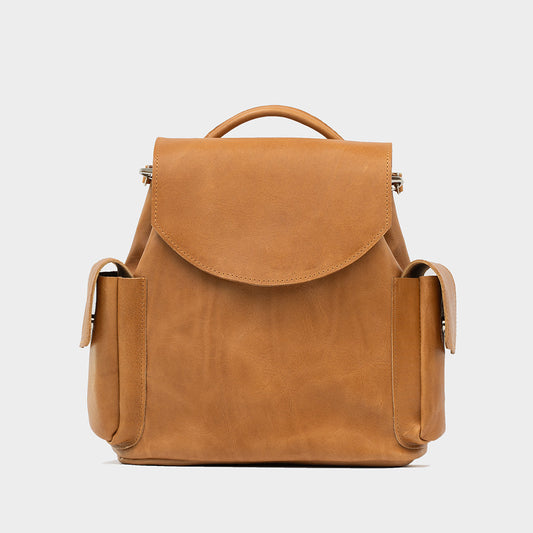 Camel leather backpack Chatelet made from vegetable-tanned Italian full-grain leather with multiple pockets and compact design