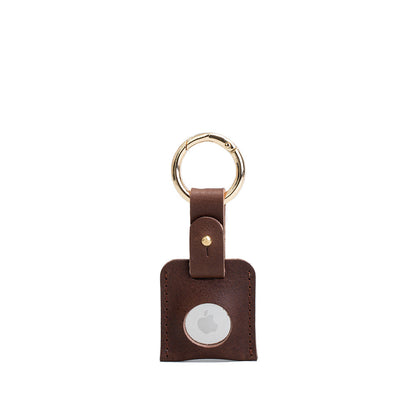 Brown leather AirTag keychain with gold circle carabiner handcrafted from premium Italian leather