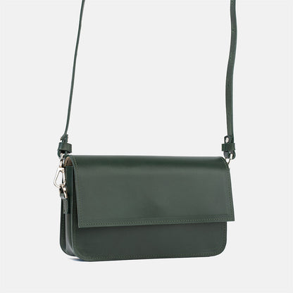 Forest green leather shoulder bag with sleek design and adjustable strap