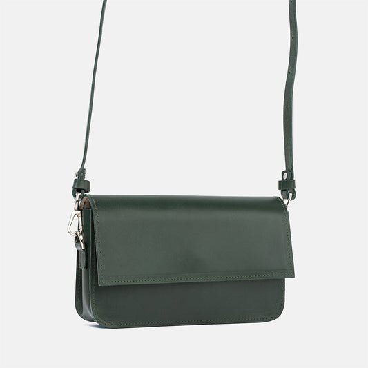 Forest green leather shoulder bag with sleek design and adjustable strap