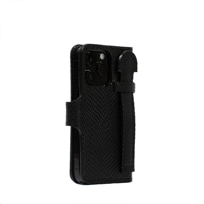 Black leather MagSafe folio wallet case with grip for iPhone 15 series, handcrafted in Tuscany with suede lining and multiple card pockets.