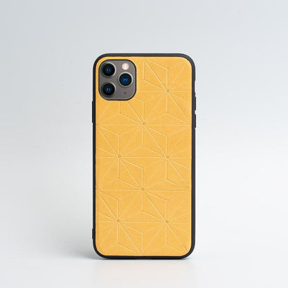 Leather Case for iPhone 11 Pro Max in tan vegetable-tanned leather with geometric flower pattern and black TPU bumper