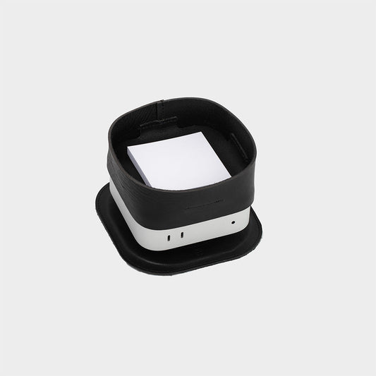 Black Italian leather Mac Mini Tray mounted on Mac Mini with small note inside for desk organization