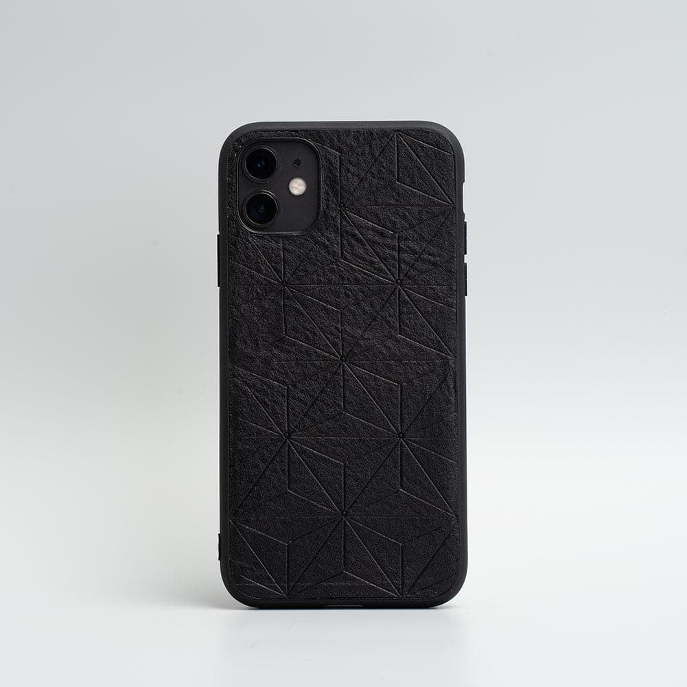 Black leather case for iPhone 11 with geometric flower pattern and TPU bumper protection