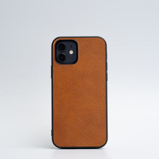 Brown full-grain leather iPhone case with black TPU bumper for protection, handcrafted in Europe.