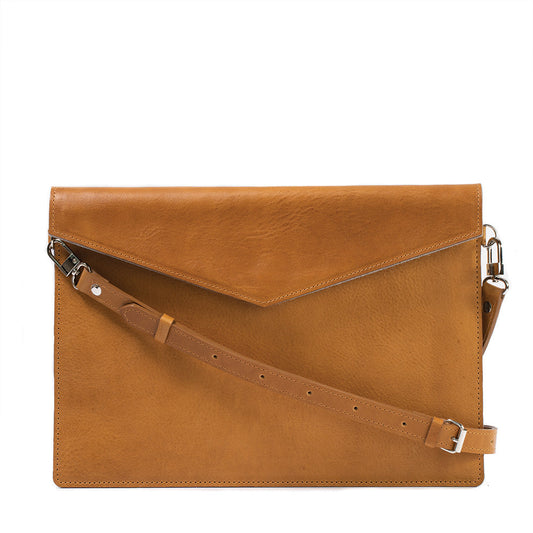 Premium full-grain leather iPad bag with adjustable strap and envelope-style closure