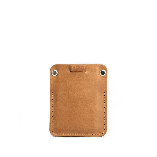 Minimalist tan leather AirTag wallet with stitched edges and hidden AirTag pocket for up to 7 cards.