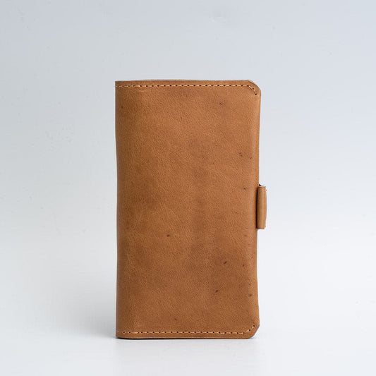 Brown leather iPhone folio wallet with MagSafe and magnetic closure
