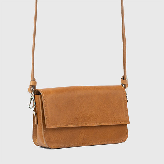 Camel leather shoulder bag with adjustable strap and sleek design