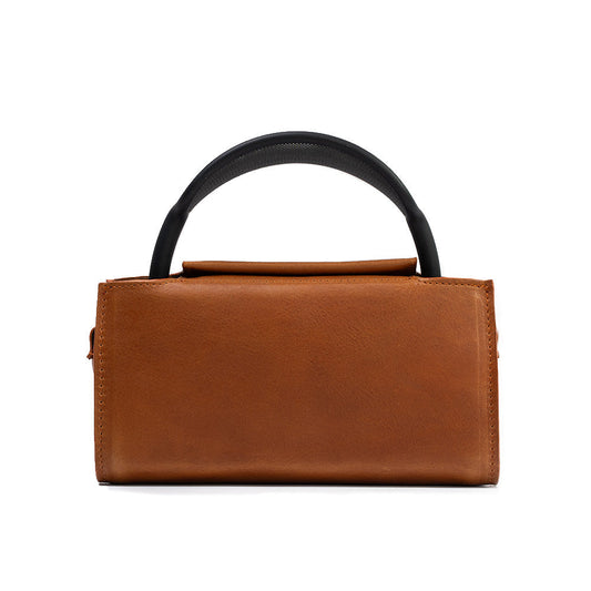 Tan leather case for AirPods Max with padded protection and black handle